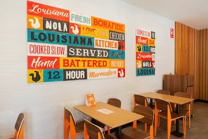 fotografía  Popeyes Louisiana Kitchen Restaurante especializado en pollo en Chiclana de la Frontera